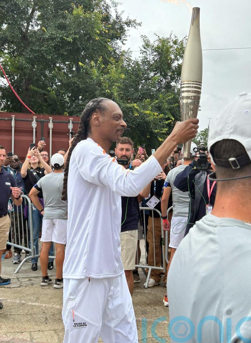 Don’t drop it like it’s hot Snoop Dogg! Rapper in Paris to carry Olympic torch