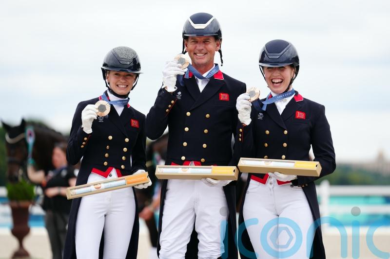 Carl Hester hints at retirement after a challenging week ends with medal success