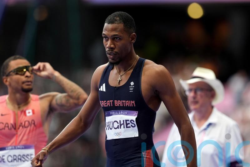 Zharnel Hughes withdraws from 200m heats with ‘hamstring tightness’