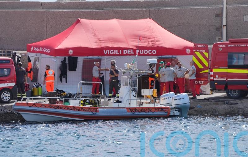 More inspections of sunken yacht carried out as hunt goes on for six feared dead