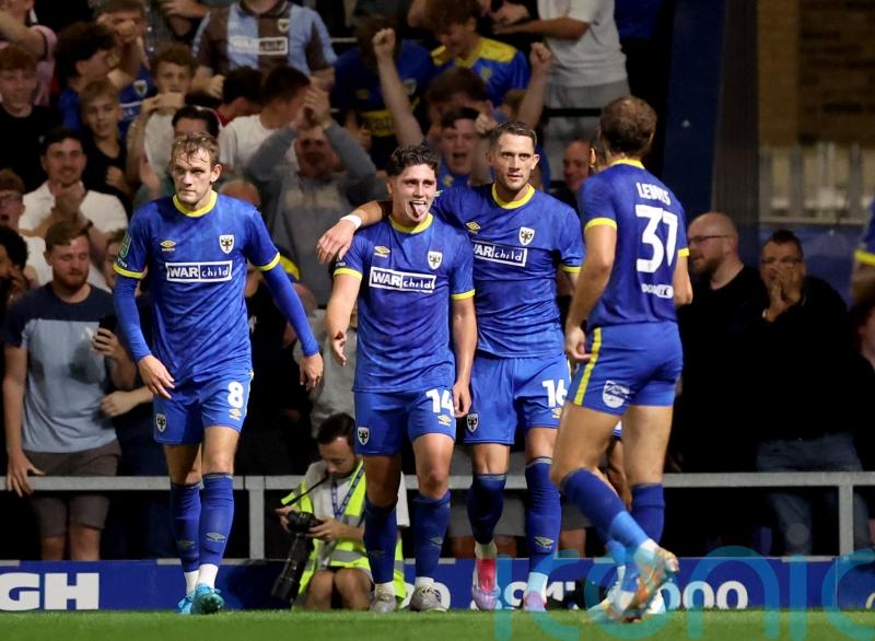 AFC Wimbledon stun Ipswich on penalties in Carabao Cup