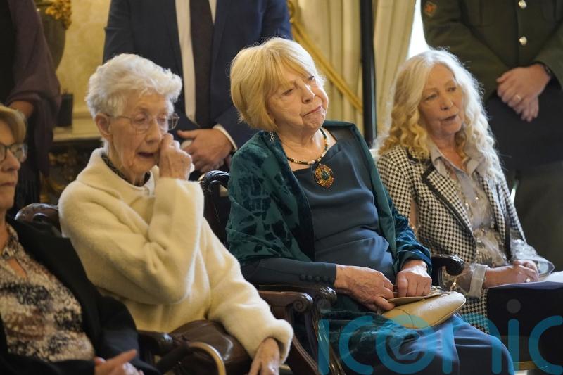 Higgins hails ‘tenacity’ of Stardust families at Aras reception