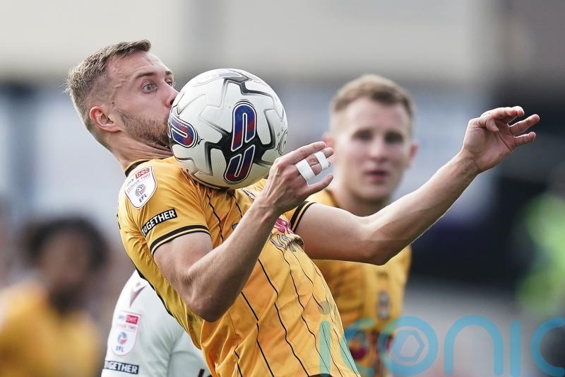 Shane McLoughlin’s late penalty snatches Newport a draw at AFC Wimbledon