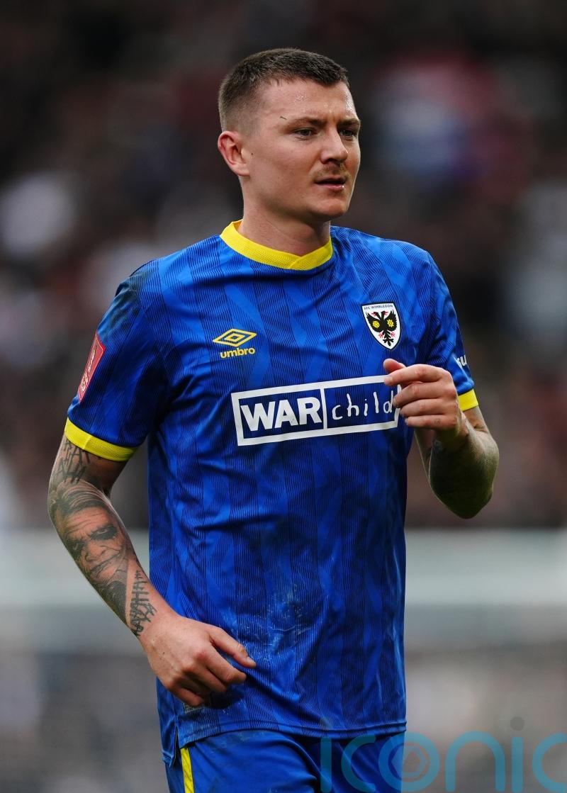 James Tilley header earns AFC Wimbledon win over Bradford