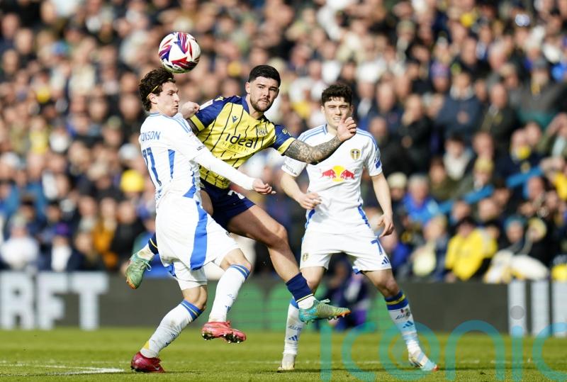 Leeds’ promotion run given a reality check by battling West Brom