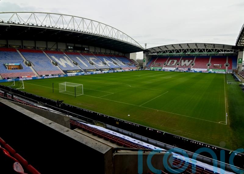 Luke Robinson gives managerless Wigan victory over Cambridge