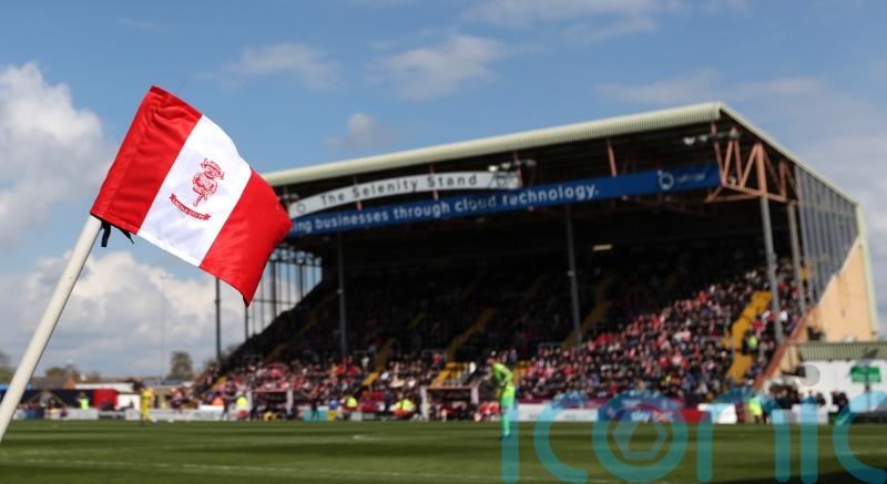 Exeter boss Gary Caldwell sees red in bore draw at Lincoln