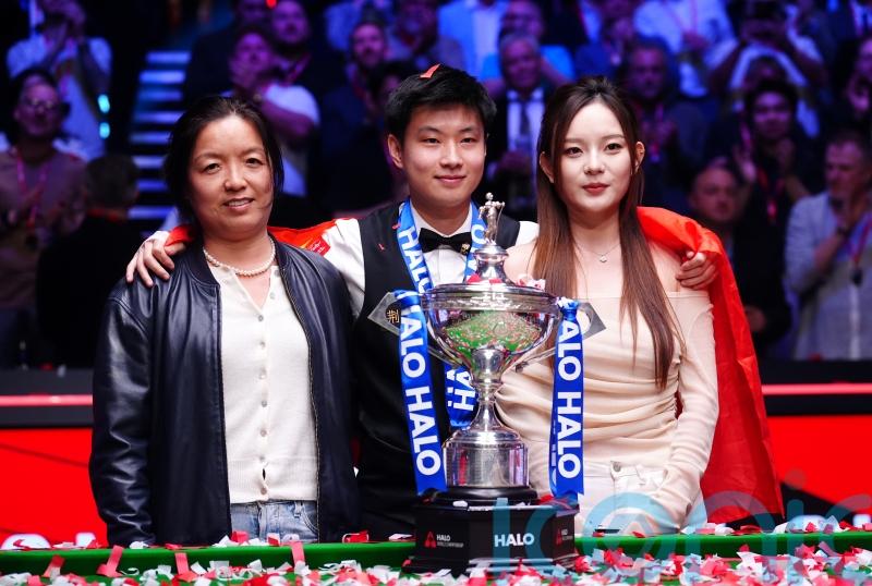 World champion Zhao Xintong’s manager will not let spending splurges wreck dream