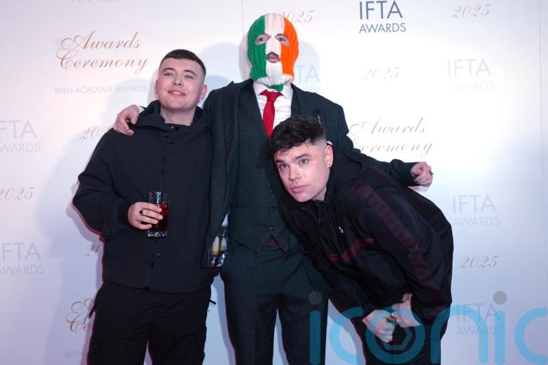 UK and Irish governments should ‘consider their actions’ over Kneecap funding