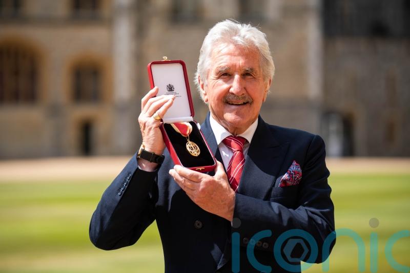 Gerald Davies calls for greater support for volunteers on receiving knighthood