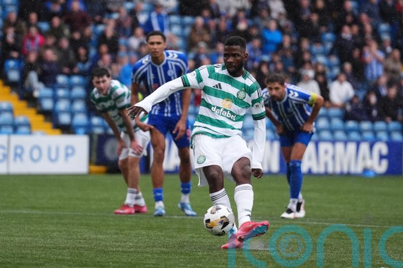Kelechi Iheanacho scores late penalty on debut as Celtic win amid fans’ protest