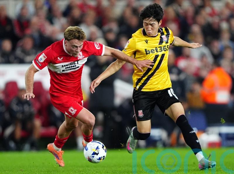 Leaders Middlesbrough survive Stoke’s second-half onslaught to stay unbeaten