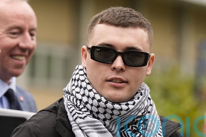 Prosecutors appeal against decision to dump terror case against Kneecap rapper