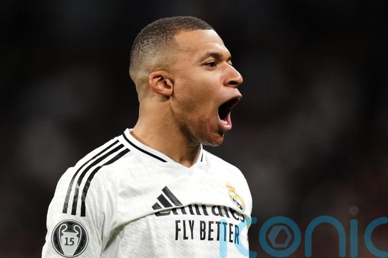 Kylian Mbappe nets late winner as Real Madrid beat nine-man Getafe to go top