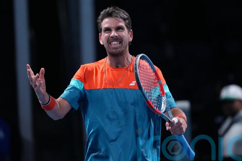 Cameron Norrie gets into party spirit as he reaches Australian Open third round