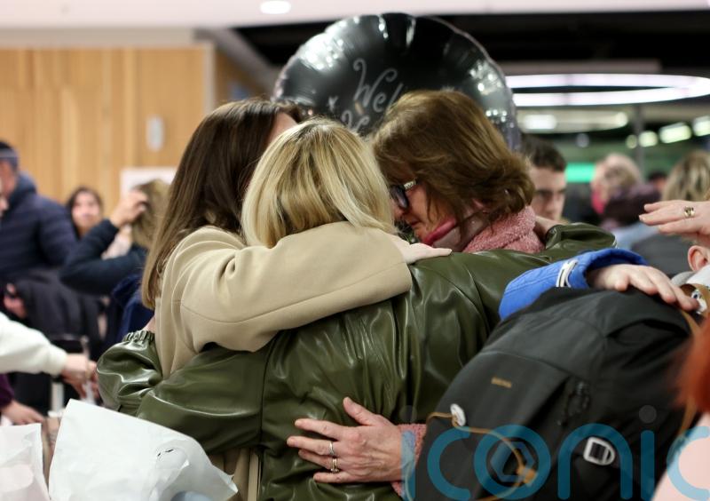 Relieved family reunions at Dublin Airport as chartered flight lands