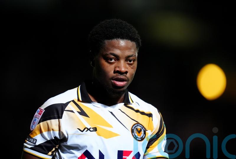 Newport climb out of League Two relegation zone with comeback win at Barnet